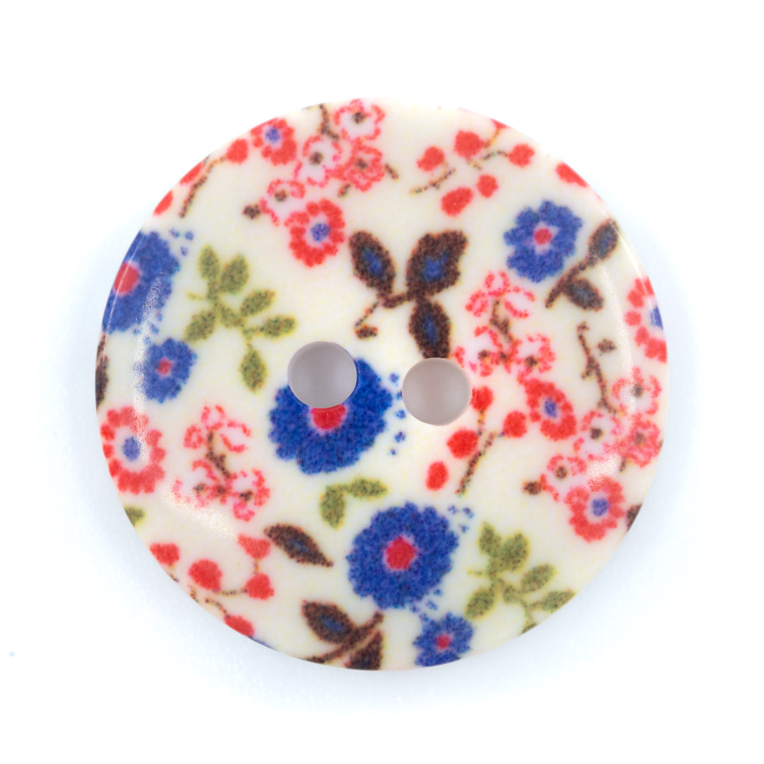 Bouton décor fleuri en plastique