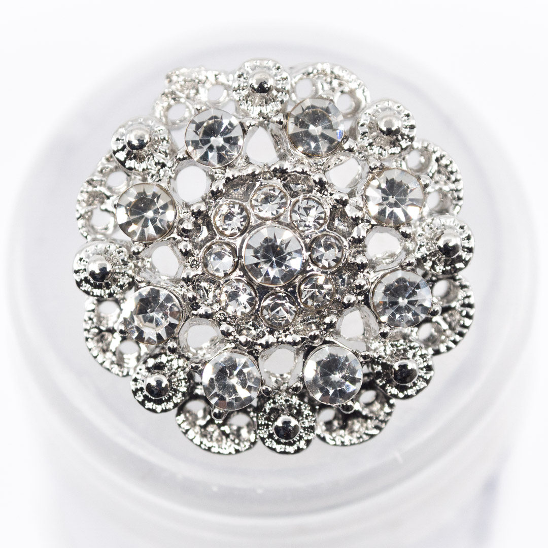 Bouton crystal fleur métal. bouton à queue.